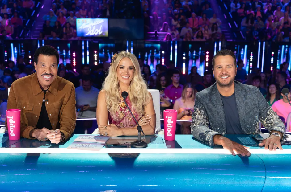 American Idol Season 23 judges panel featuring Lionel Richie, Carrie Underwood, and Luke Bryan smiling during show
